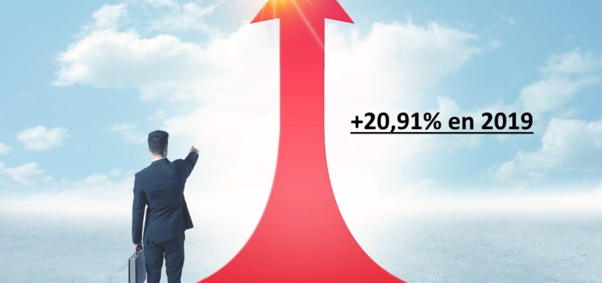 Concept of the road to success with a businessman standing on a red arrow
