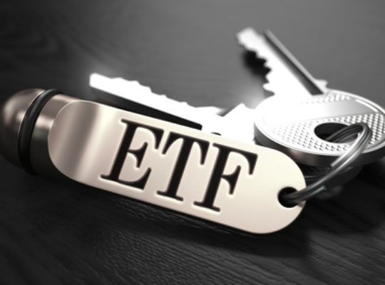 ETF - Exchange Traded Fund - Concept. Keys with Keyring on Black Wooden Table. Closeup View, Selective Focus, 3D Render. Black and White Image.